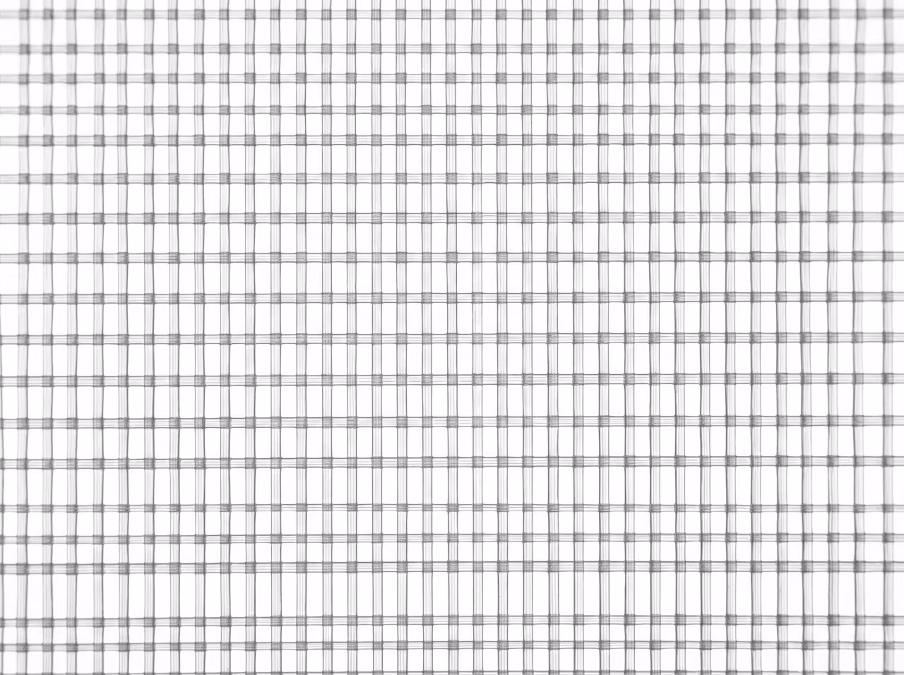Close-up of the square open weave of nylon monofilament liquid filter mesh